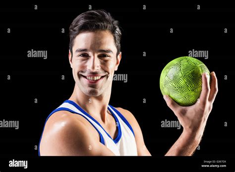Portrait Of Athlete Man Holding A Ball Stock Photo Alamy