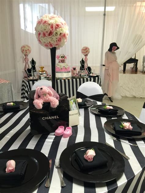 I also love the all of the fun eiffel tower decorations and the use of feathers and flowers! Modern Chic Chanel Baby Shower - Baby Shower Ideas ...
