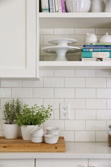 As you can see here, we went with this look in our upstairs bathrooms. An Urban Cottage: White vs. Gray Grout