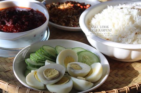 Delicious rice and squid combine for a memorable meal here. Nasi Lemak Beras Kampung & Sambal Kerang - AMIE'S LITTLE ...