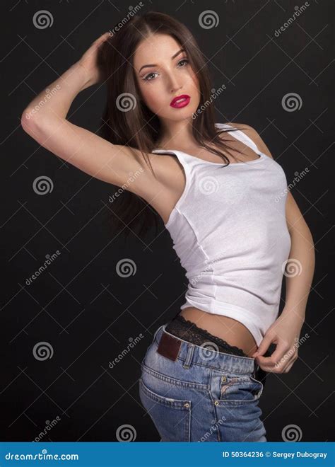 Beautiful Girl In A White T Shirt And Jeans Stock Photo Image Of