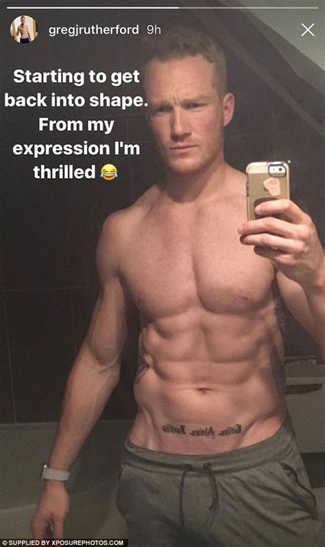 Greg Rutherford Flashes Perfectly Sculpted Washboard Abs Daily Mail Online