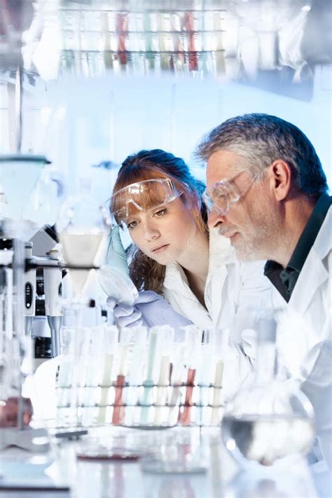 Health Care Researchers Working In Scientific Laboratory Stock Photo