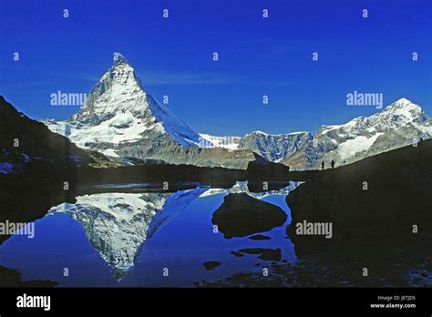 Matterhorn Is Reflected In A Mountain Lake Matterhorn Spiegelt Sich In