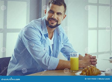 A Business Man Breakfasts With Notebook And Juice Stock Photo Image