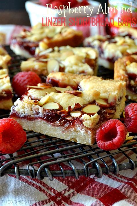 Delicious made with other types of jams and preserves, too! Raspberry Almond Linzer Shortbread Bars | The Domestic Rebel
