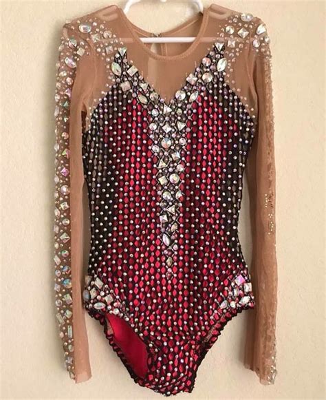 A Red And Black Leotard Bodysuit With Sequins On It