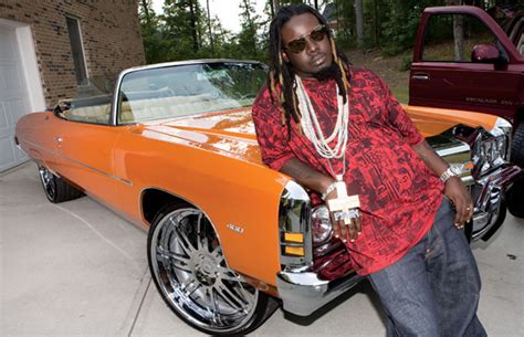 30 Photos Of Rappers Flexing With Giant Car Rims Complex