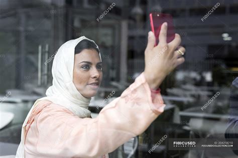 Elegant Moroccan Woman With Hijab And Typical Arabic Dress Taking