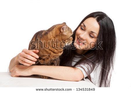 Beautiful Smiling Brunette Girl And Her Ginger Cat Over White