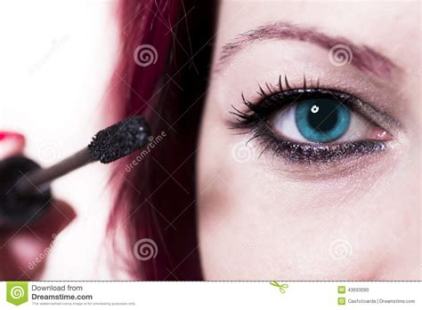 Woman Applying Mascara On Eyelashes Stock Photo Image Of