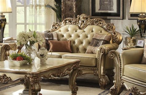 This stylish and detailed collection is ideal for a large gathering and will add elegance to any dining room decor. Gold Patina Vendome Royal Living Set By ACME Furniture
