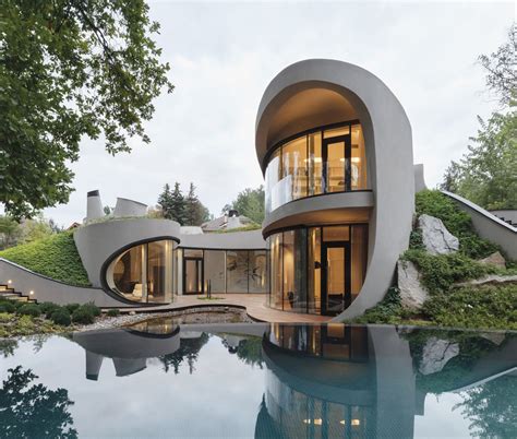 Futuristic Organically Shaped Home Balances Architectural And Natural