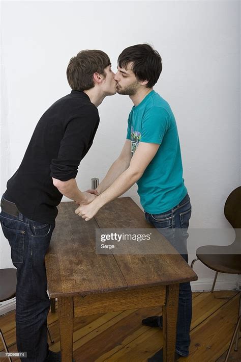 Two Gay Men Kissing Photo Getty Images