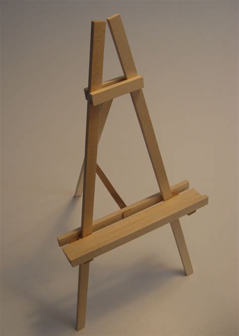 First fold the card in half, then fold the second score line (6 3/8) opposite from the. A Doll for all Seasons: How to make an easel for your doll: