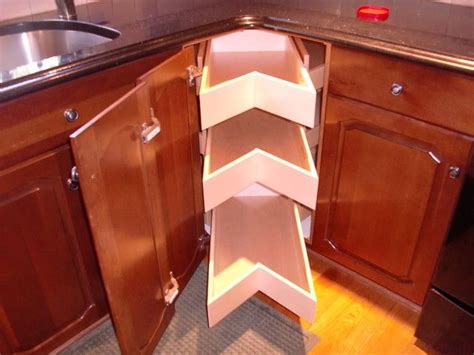 The two doors fold and disappear into the cabinet, enabling you to search for what you are looking for unencumbered. corner unit lazy susans glide arounds portland by from ...