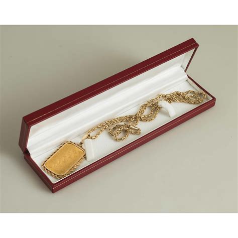 These gold chains come expertly made, plated with only the best solid gold. Swiss Gold Bar Pendant & Chain | Witherell's Auction House