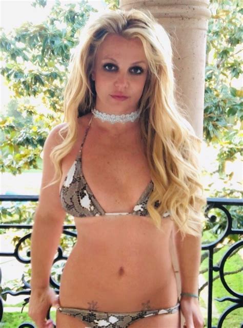 Britney Spears Strips Down To A Snakeskin Bikini In Sultry Snaps And