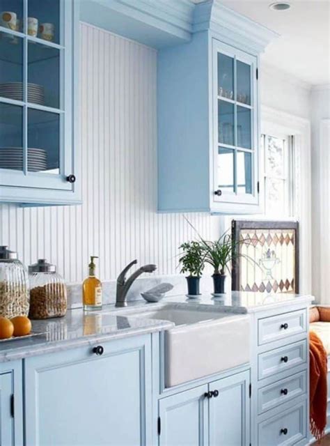 Pretty upholstery takes the rustic bar stools from bland to snazzy. Attractive Kitchen Cabinets Colors You Can Choose | Cottage style kitchen, Light blue kitchens ...
