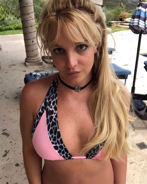 Britney Spears Rocks Bikini And Mask As She Gushes All You Need Is Love During Beach Date With