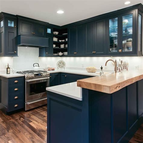 beautiful in blue rich navy cabinetry brass hardware and a live edge counter tailor this