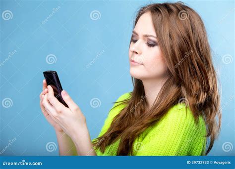 Woman Texting While Looking Surprised On Phone Stock Image Image Of