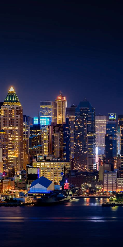 Download Wallpaper 1080x2160 Manhattan Cityscape Night Buildings