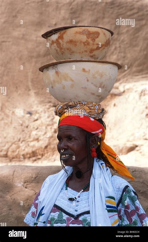 A Fulani Woman With Calabashes Balanced On Her Head Tereli Pays Dogon