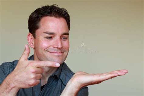 Smiling Man Pointing Right With Finger Stock Photo Image Of Pointing