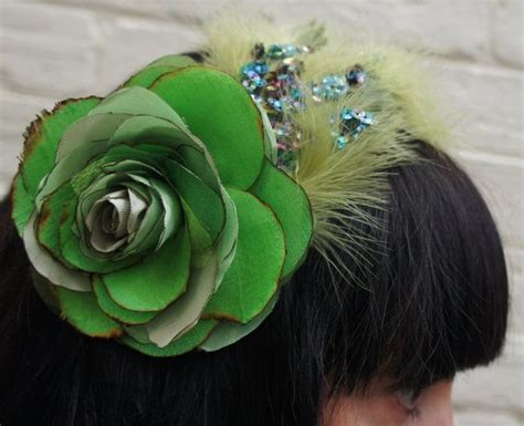 The emerald green arborvitae, thuja occidentalis 'smaragd', is a conifer evergreen that grows in a narrow pyramidal shape. Emerald green vintage silk and satin flower fascinator by ...