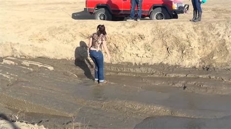Silly Girl Attempts Mud Pit In Jeep And On Foot Youtube