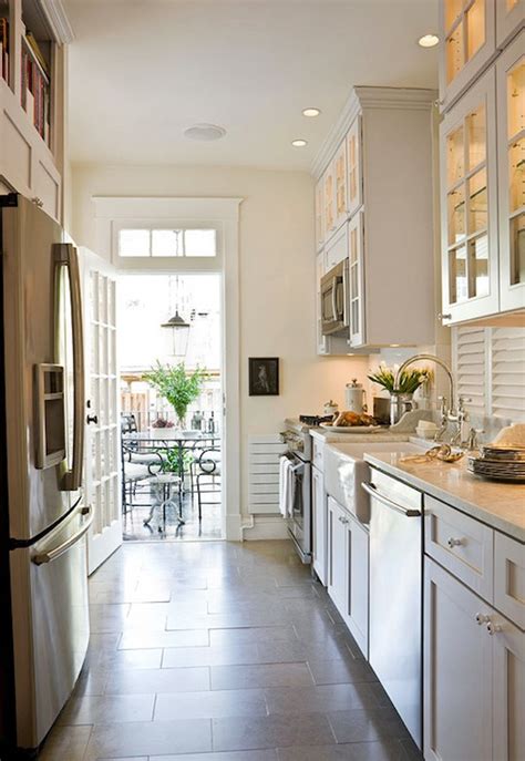 No one will be thinking about how cramped the room is. White Galley Kitchen - Transitional - kitchen - Benjamin ...