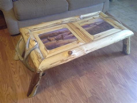 Spread coffee grounds around your garden. aspen coffee table with full set of deer antlers & 2 white ...
