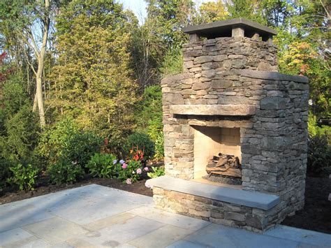 Outdoor Stone Patio Fireplace By Cording Landscape Design Cording