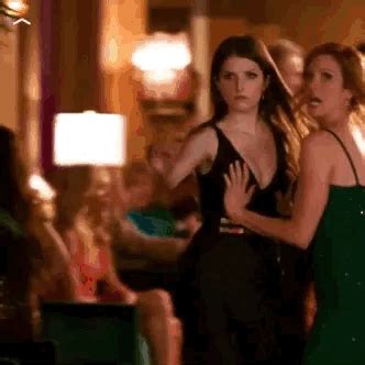 Two Women In Evening Wear Dancing At A Party