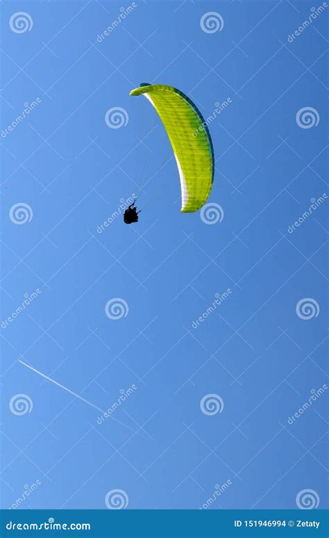 Paraglider Flight Through The Blue Sky Editorial Stock Image Image Of