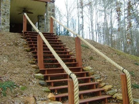 Rope deck railings are tied with decorative nautical netting. Ropes, Handrail brackets and Play structures on Pinterest