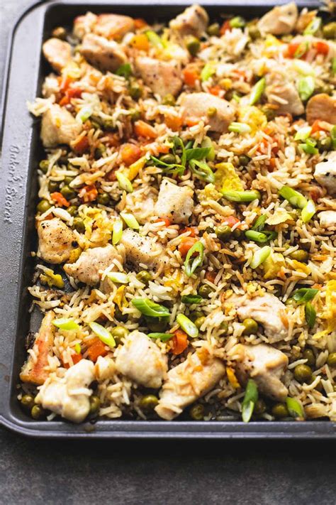 This quick chicken starter recipe will impress guests yet give you more time for entertaining. One Sheet Pan Chicken Fried Rice | Creme De La Crumb