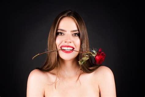 Seductive Sensual Woman Holding Red Rose With Teeth Woman With Naked Shoulder And Rose Flower