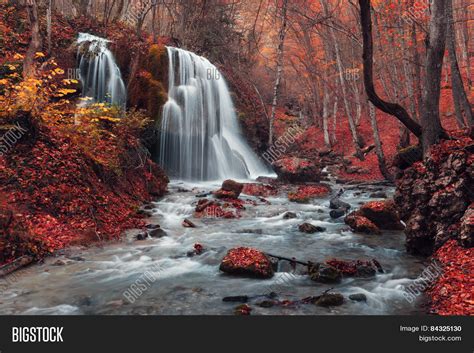 Beautiful Waterfall In Autumn Forest Stock Photo And Stock