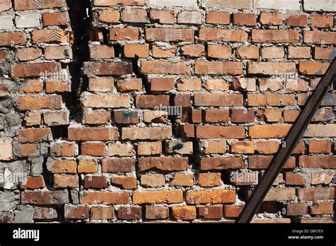 Cracked Brick Wall As Background Stock Photo Alamy