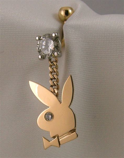 An Unusual Order Diamond And Gold Playboy Bunny Belly Button Ring