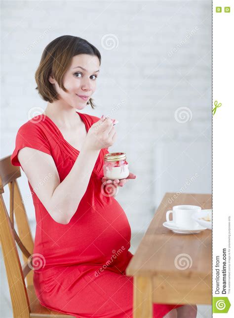Decadent dessert (without the guilt!) there's no skimping with these raspberry turnovers, says all recipes from healthy eating during pregnancy by erika lenkert with brooke alpert, ms, rd, cdn. Cute Pregnant Woman Eating Dessert Stock Image - Image of expecting, mother: 73897663