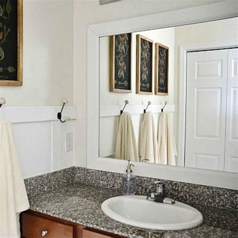 Terracotta design switches out the faucet, hardware and tile for an instantly dramatic transformation. Bathroom Mirror Upgrade. Easy and cheap bathroom upgrade. Frame your mirror to add that extra ...