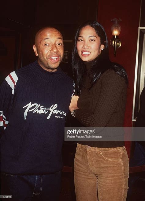 Producer Russell Simmons And Wife Kimora Lee Arrive At The Premiere Of