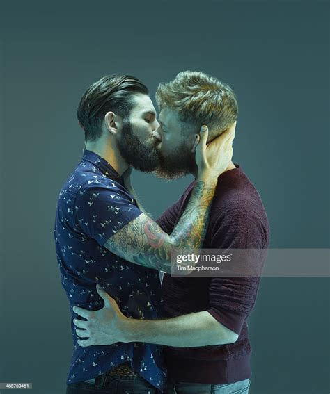 Two Bearded Men Kissing Photo Getty Images