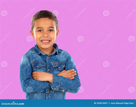 Funny Small Child With Dark Hair And Black Eyes Crossing His Arms Stock