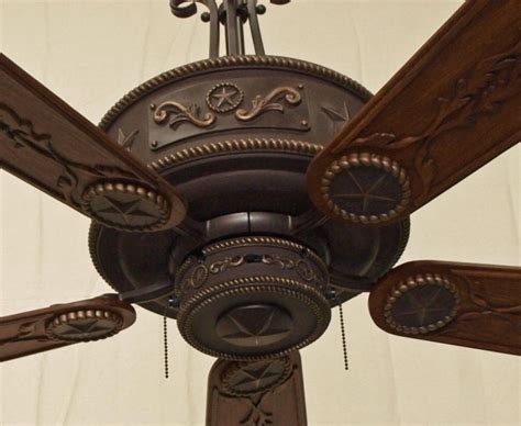 Great ceiling fan, particularly if you can get it for under $150. Cooper Canyon Western Star Ceiling Fan - Rustic Lighting ...