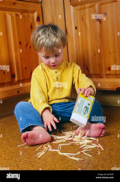 Toddler Playing With Box Of Matches Stock Photo 3458382 Alamy