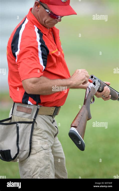 Usmc Skeet Team Member Master Gysgt William Mckenon Loads His Shotgun